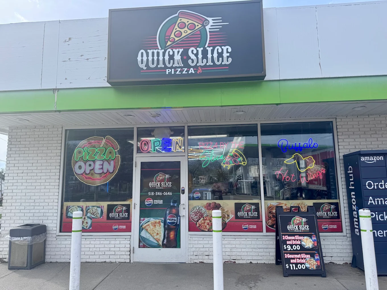 Exterior storefront of Quick Slice Pizza on Albany St in Schenectady, NY