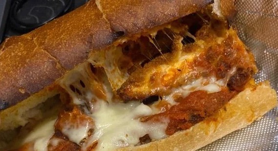 Chicken parm sub with melted cheese from Quick Slice Pizza